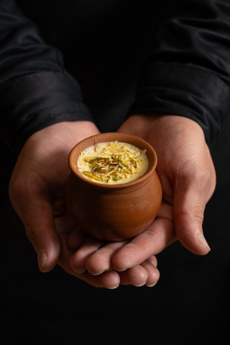 A traditional clay cup of a sweet, nutty dessert drink